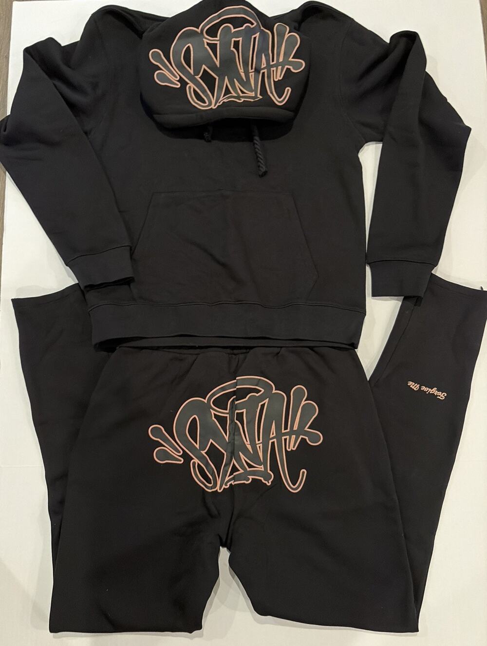 Syna World Black Hoodie with Rose Gold Logo “Can’t Rush Greatness” & pants Large